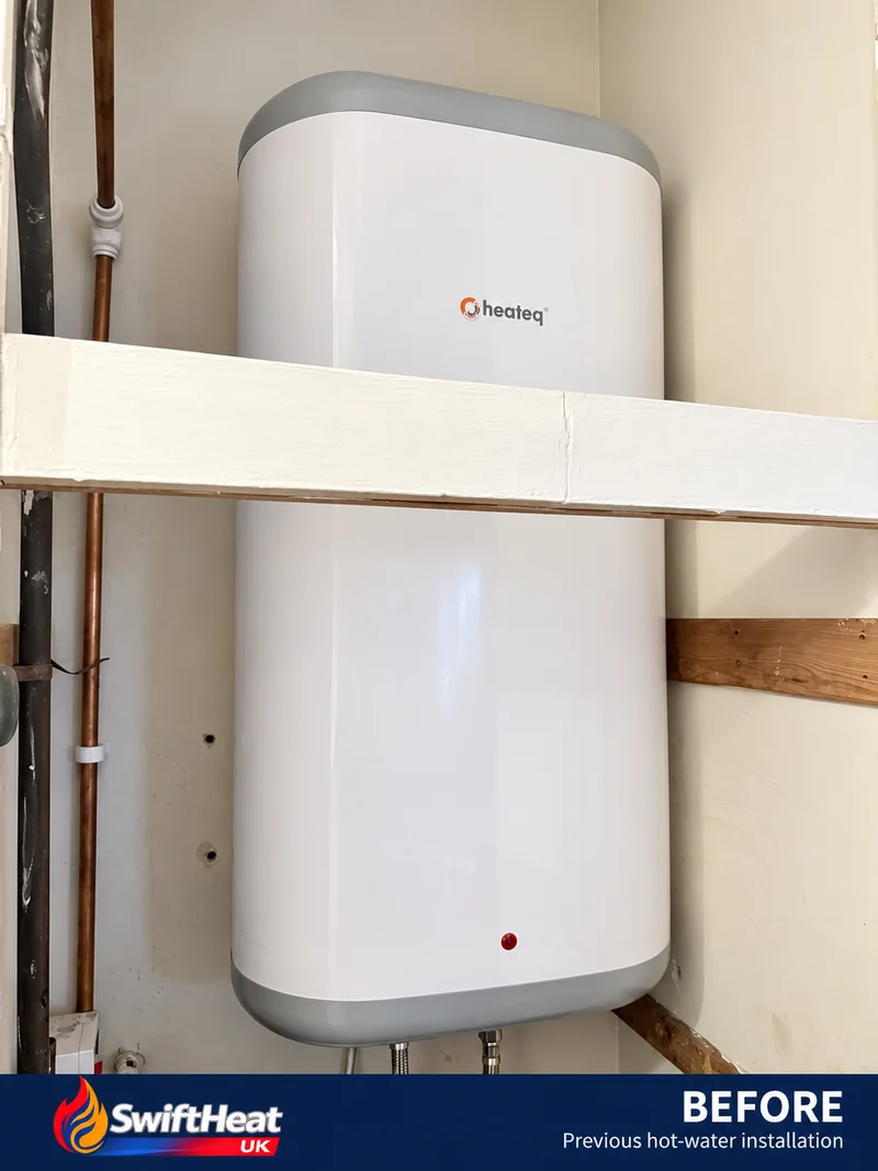 Previous electric hot-water heater in the Cardiff property before replacement